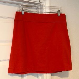 Orange side zipper mini skirt